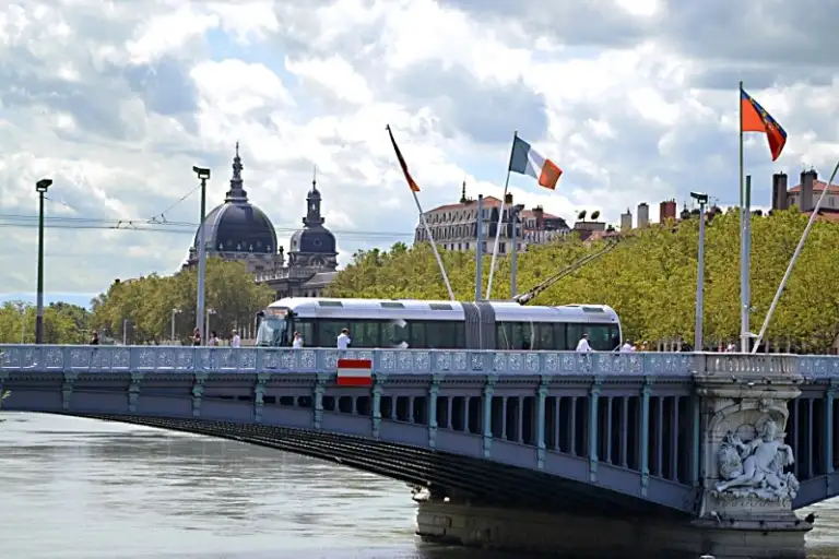 A trolleybus crosses a bridge in Lyon
